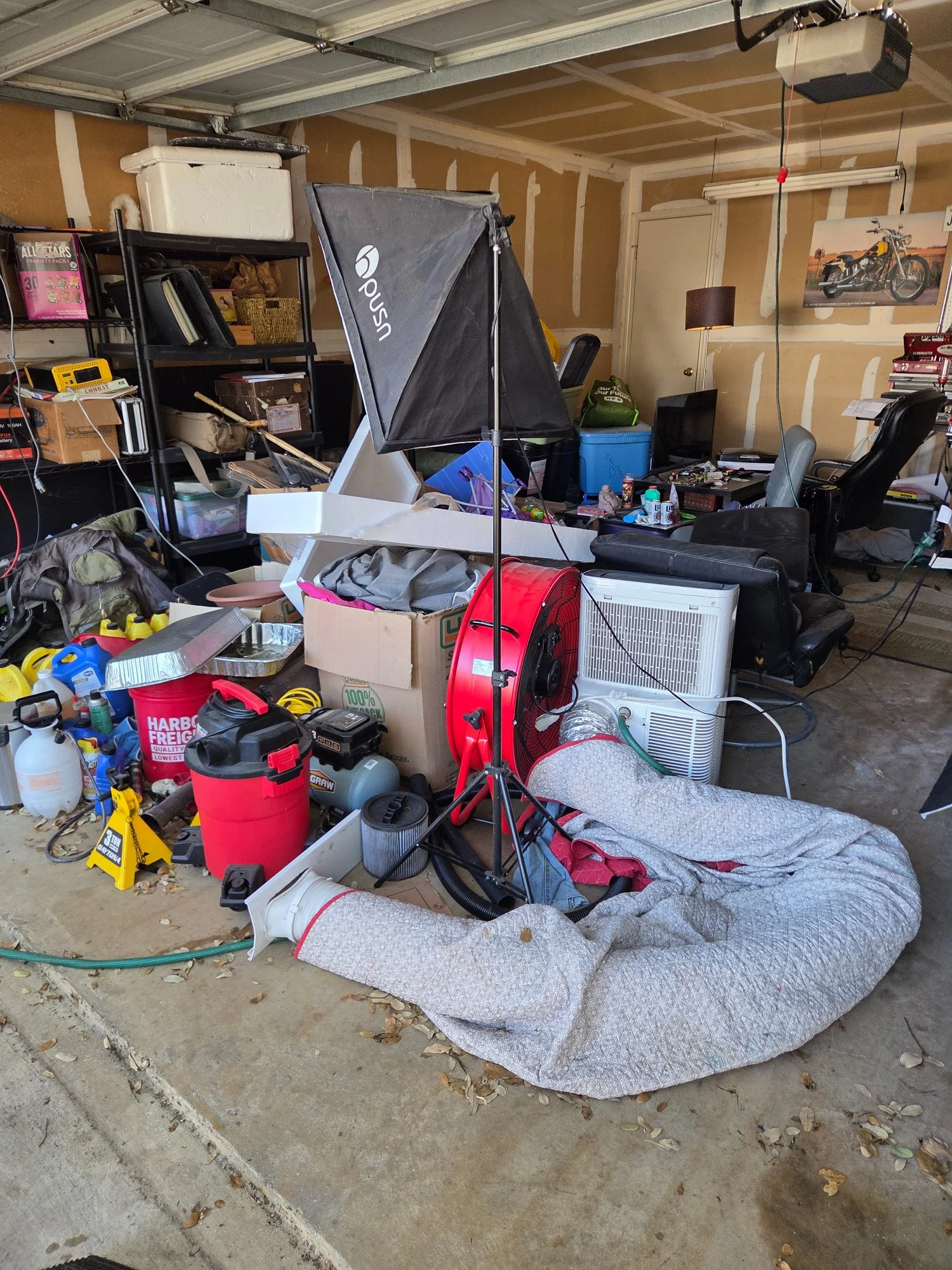 Cluttered garage before junk removal in Leander TX
